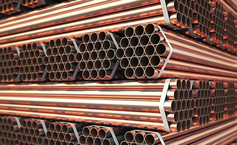 copper or bronze metal pipes in warehouse heavy no